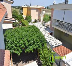 Case - Mansarda a marina di ginosa con terrazzo, giardino e posti auto