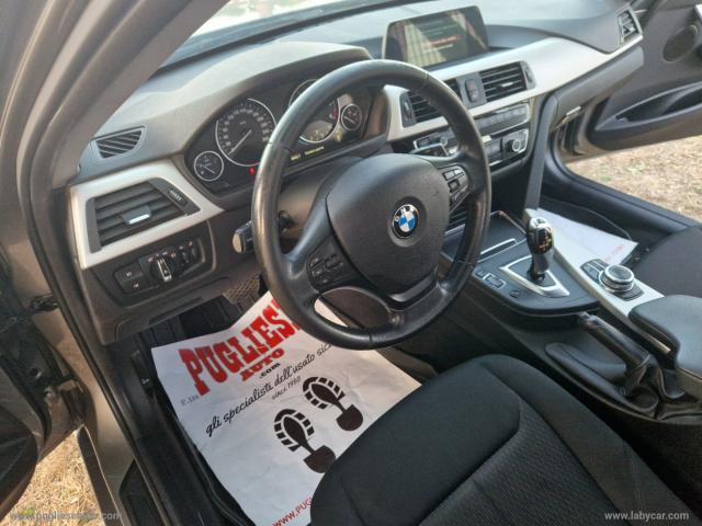 Auto - Bmw 318d touring business advantage aut.