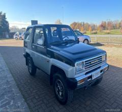 Auto - Daihatsu feroza 1.6i resin-top dx