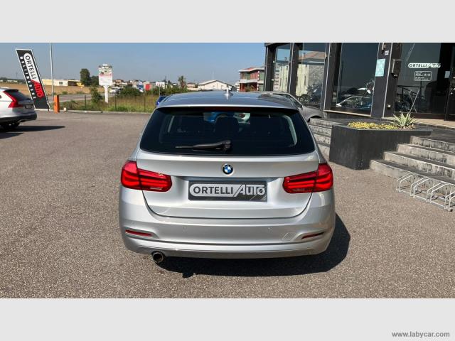 Auto - Bmw 318d touring business advantage aut.