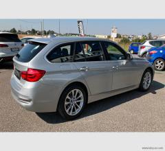 Auto - Bmw 318d touring business advantage aut.