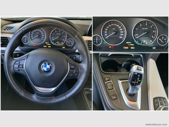 Auto - Bmw 318d touring business advantage aut.