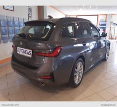 Auto - Bmw 318d touring business advantage aut.