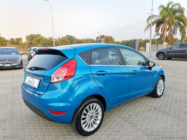 Auto - Ford fiesta 1.4 5p. bz.- gpl titanium