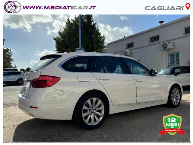 Auto - Bmw 316d touring business advantage aut.