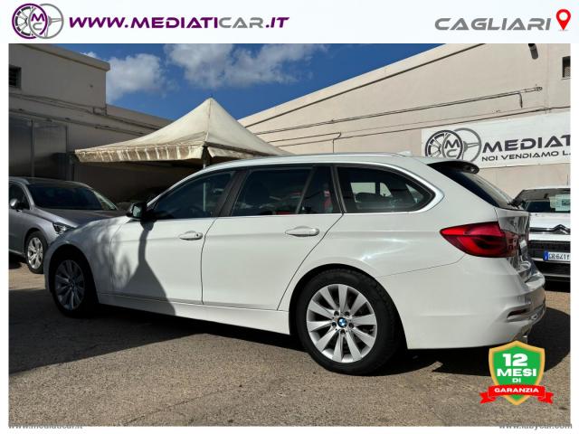 Auto - Bmw 316d touring business advantage aut.