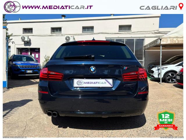 Auto - Bmw 520d touring business aut.