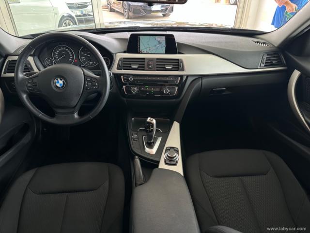 Auto - Bmw 318d touring business advantage aut.