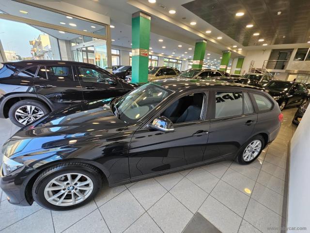 Auto - Bmw 318d touring business advantage aut.