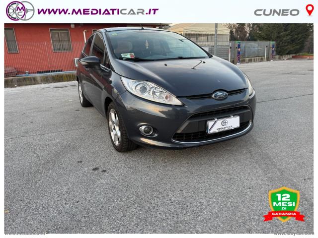 Auto - Ford fiesta 1.4 5p. bz.- gpl titanium