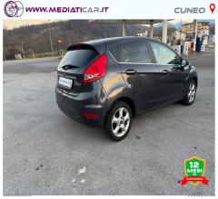 Auto - Ford fiesta 1.4 5p. bz.- gpl titanium