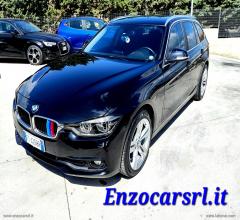 Auto - Bmw 318d touring business advantage aut.