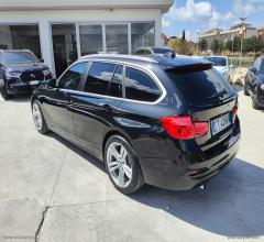 Auto - Bmw 318d touring business advantage aut.