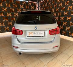 Auto - Bmw 318d touring business advantage aut.