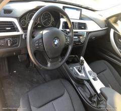 Auto - Bmw 318d touring business advantage aut.